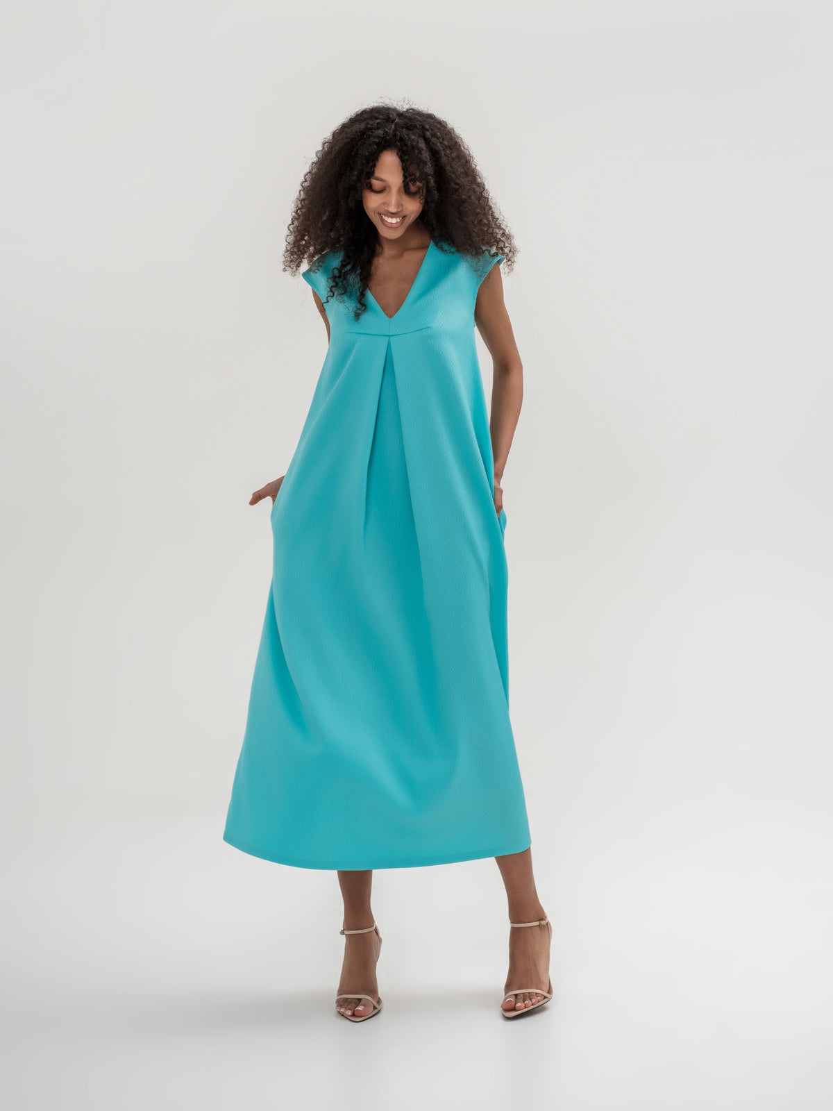 Long mint dress with pockets sleeveless V-neck